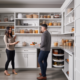 An image of a neatly organized pantry with labeled containers and baskets arranged on shelves, with tips written in speech bubbles such as "group like items together" and "use clear containers for easy visibility".